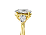 18K Yellow Gold 1.56 Carat D VS1 Oval Diamond Three-Stone Ring with Pear Side Stones and Prong Setting