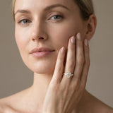 18K Yellow Gold 1.56 Carat D VS1 Oval Diamond Three-Stone Ring with Pear Side Stones and Prong Setting