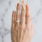 Yellow gold Oval Cut Diamond Three-Stone Ring with Round Side Stones and Pavé Band_128