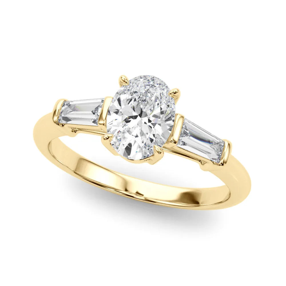 Yellow gold Oval Cut Diamond Three-Stone Ring with Tapered Baguette Side Stones and Prong Setting