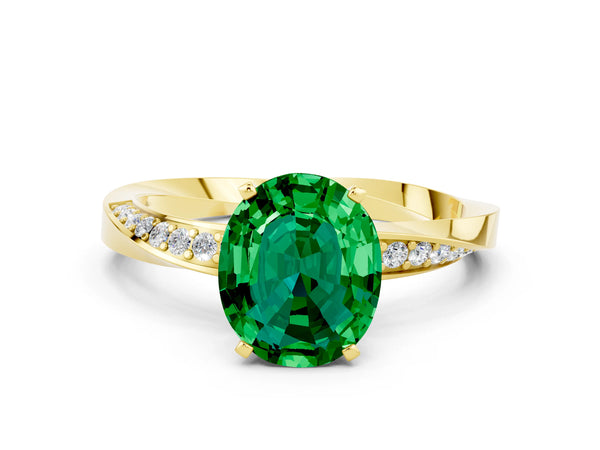 Yellow gold Oval Cut Emerald Engagement Ring with Side Stone Accents and Four-Prong Setting