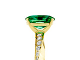 Yellow gold Oval Cut Emerald Engagement Ring with Side Stone Accents and Four-Prong Setting_65