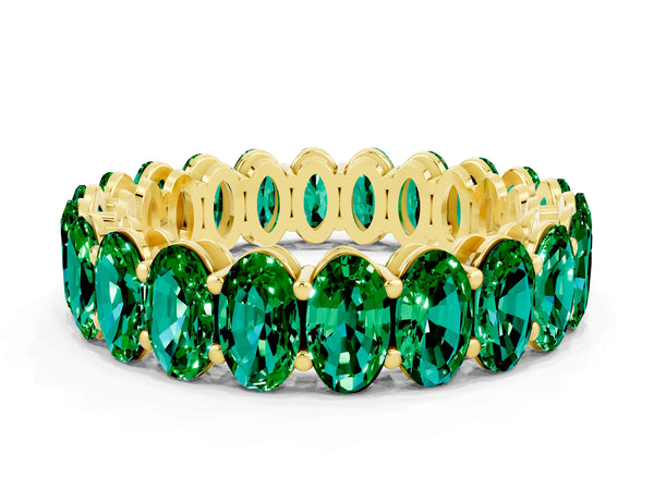 Yellow gold Oval Cut Emerald Eternity Band with Shared Prong Setting