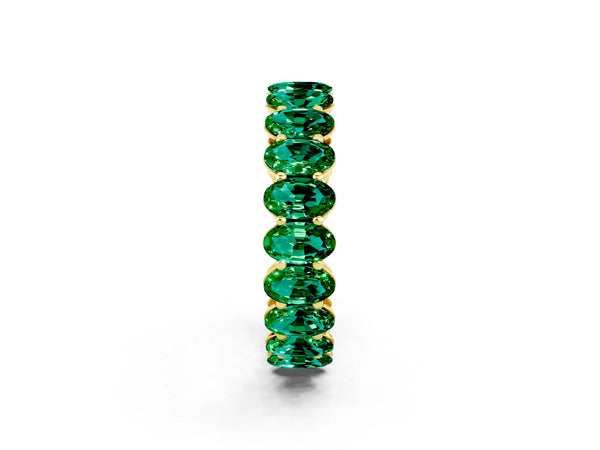 Yellow gold Oval Cut Emerald Eternity Band with Shared Prong Setting