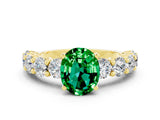 Yellow gold Oval Cut Emerald Prong Setting with Side Stones on a Pave Band