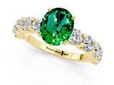 Yellow gold Oval Cut Emerald Prong Setting with Side Stones on a Pave Band_1