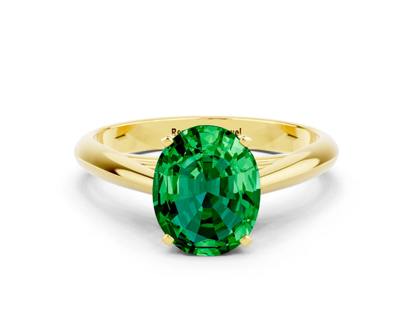 Yellow gold Oval Cut Emerald Solitaire Engagement Ring with Cathedral Setting and Four-Prong Mount