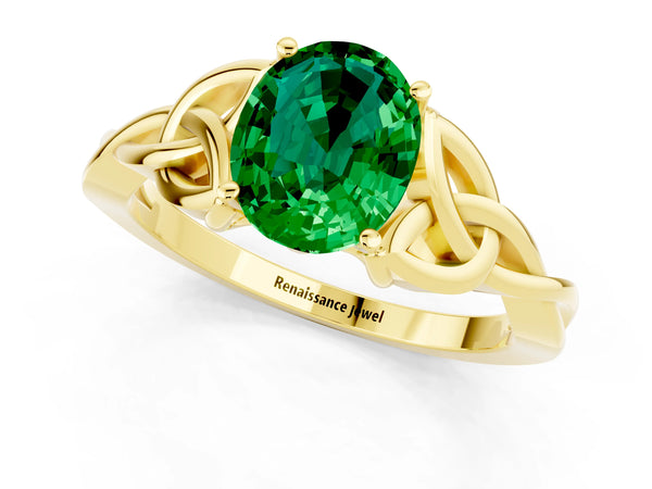 Yellow gold Oval Cut Emerald Solitaire Engagement Ring with Celtic Knot Band and Four-Prong Setting
