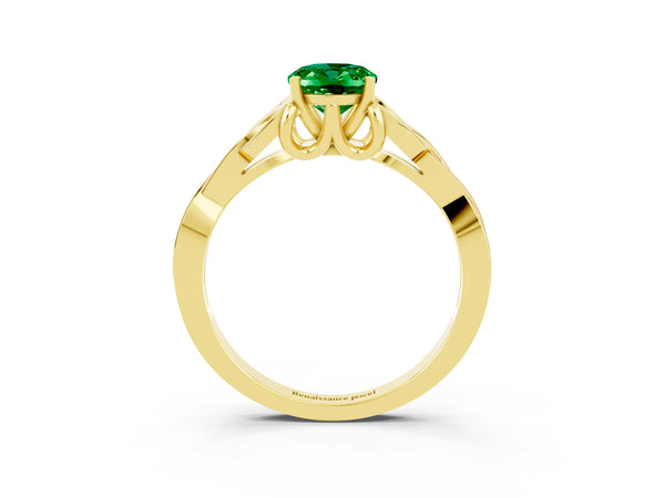 Yellow gold Oval Cut Emerald Solitaire Engagement Ring with Celtic Knot Band and Four-Prong Setting