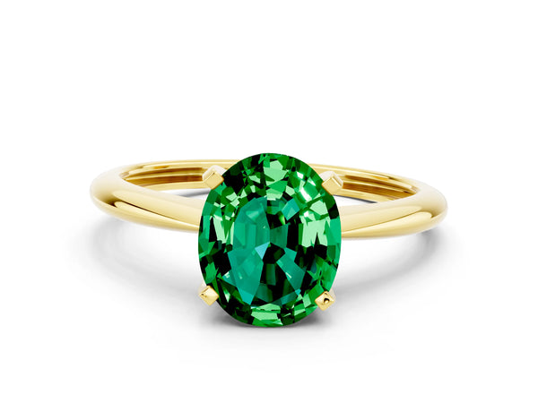 Yellow gold Oval Cut Emerald Solitaire Engagement Ring with Classic Band and Four-Prong Setting