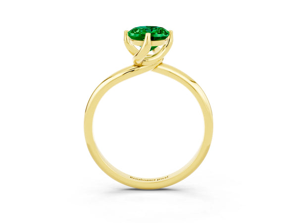 Yellow gold Oval Cut Emerald Solitaire Engagement Ring with Four-Prong Setting and Classic Band