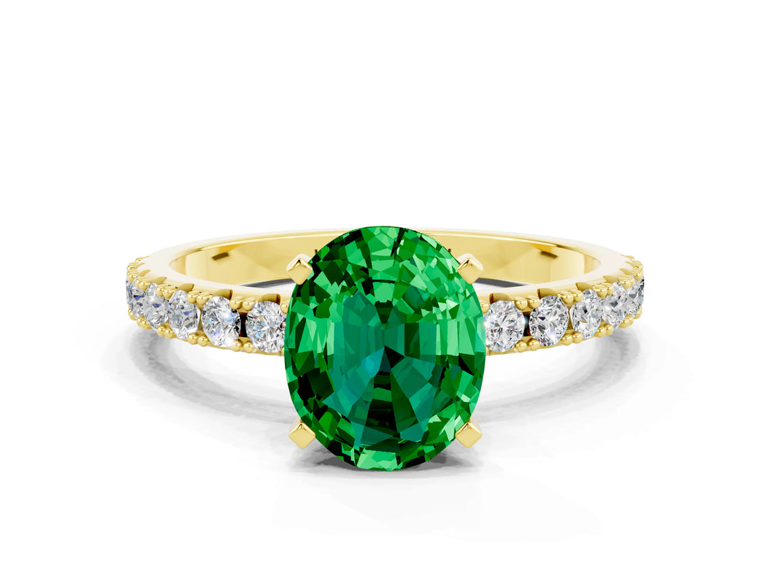 Yellow gold Oval Cut Emerald Solitaire Pavé Band with Four-Prong Setting