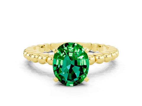 Yellow gold Oval Cut Emerald Solitaire Ring with Beaded Band and Prong Setting
