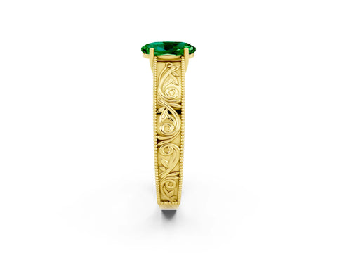Yellow gold Oval Cut Emerald Solitaire Ring with Engraved Band and Four-Prong Setting_2
