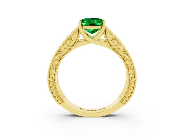Yellow gold Oval Cut Emerald Solitaire Ring with Engraved Band and Four-Prong Setting