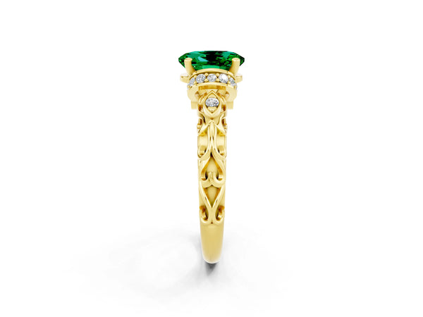 Yellow gold Oval Cut Emerald Solitaire Ring with Filigree Band and Four-Prong Setting