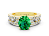 Yellow gold Oval Cut Emerald Solitaire Ring with Pavé and Channel Set Band