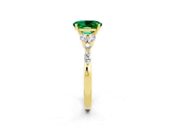 Yellow gold Oval Cut Emerald Solitaire Ring with Side Stones and Four-Prong Setting