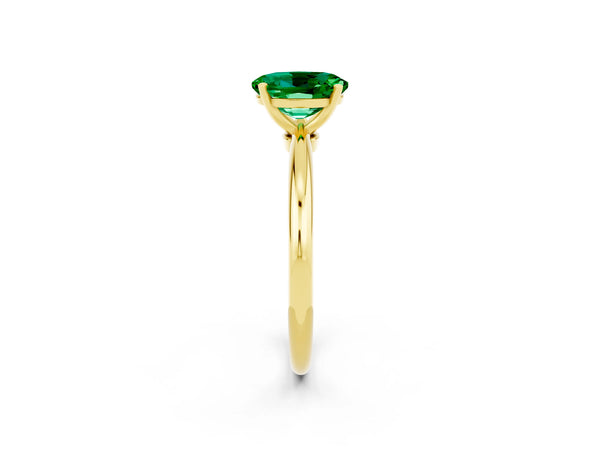 Yellow gold Oval Cut Emerald Solitaire Ring with Six-Prong Setting and Classic Band
