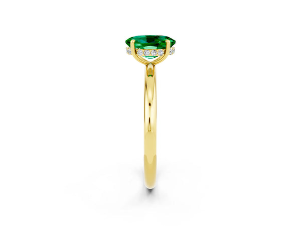 Yellow gold Oval Cut Emerald Solitaire Ring with Thin Band and Four-Prong Setting