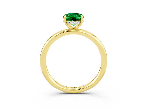 Yellow gold Oval Cut Emerald Solitaire Ring with Thin Band and Four-Prong Setting
