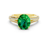Yellow gold Oval Cut Emerald Split Shank Engagement Ring with Pavé Band