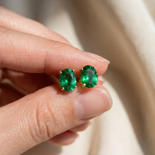 Yellow gold Oval Cut Emerald Stud Earrings