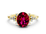 Yellow gold Oval Cut Garnet Ring with Side Stones and Four-Prong Setting_72