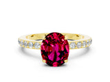 Yellow gold Oval Cut Garnet Solitaire Engagement Ring with Pavé Band and Four-Prong Setting