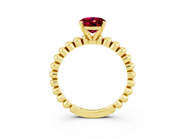 Yellow gold Oval Cut Garnet Solitaire Ring with Beaded Band and Prong Setting