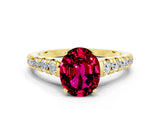 Yellow gold Oval Cut Garnet Solitaire Ring with Cathedral Setting and Pavé Band