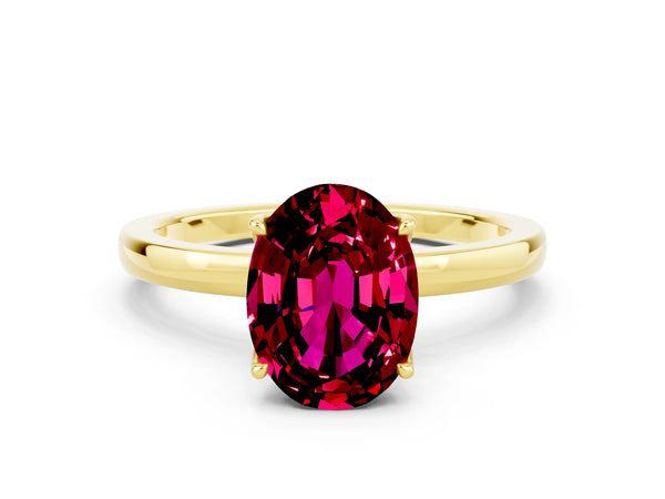Yellow gold Oval Cut Garnet Solitaire Ring with Thin Band and Prong Setting