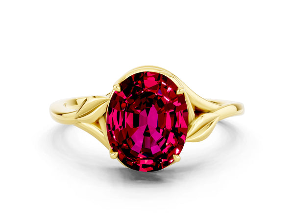 Yellow gold Oval Cut Garnet Solitaire Ring with Twist Band and Four-Prong Setting