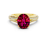 Yellow gold Oval Cut Garnet Split Shank Engagement Ring with Pavé Band
