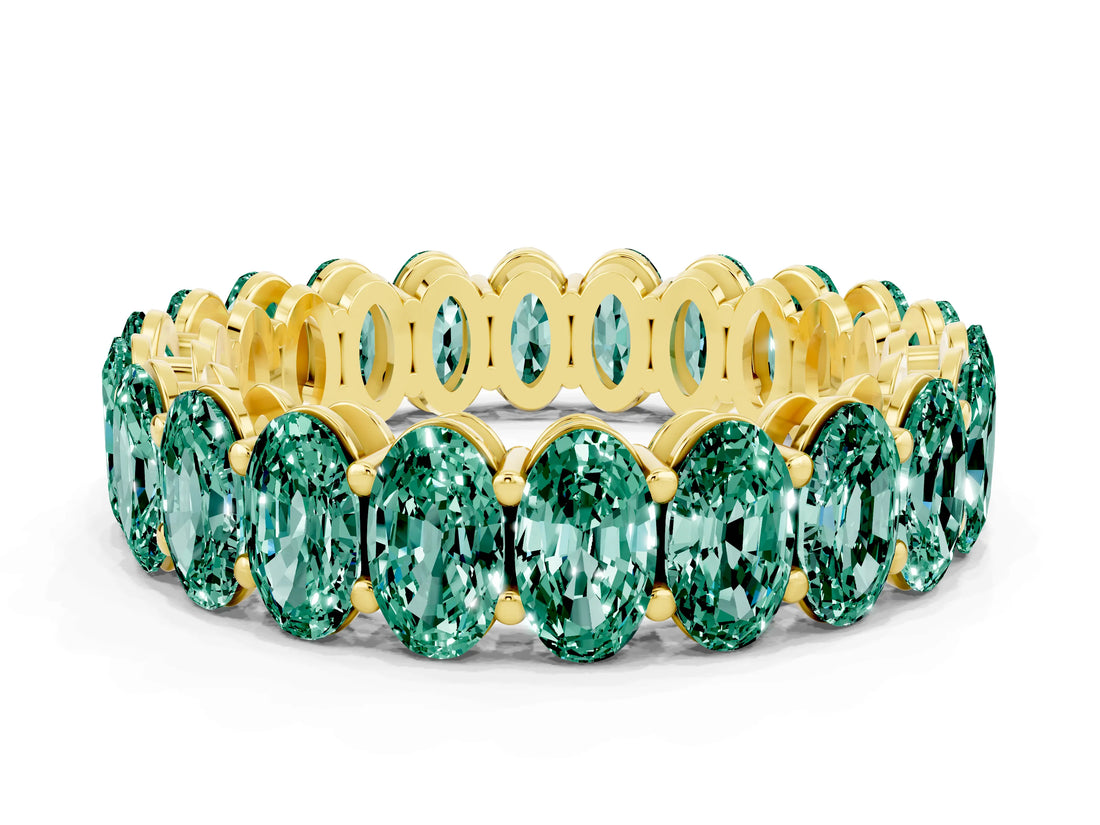 Yellow gold Oval Cut Green Sapphire Eternity Band with Shared Prong Setting