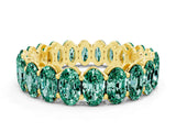 Yellow gold Oval Cut Green Sapphire Eternity Band with Shared Prong Setting
