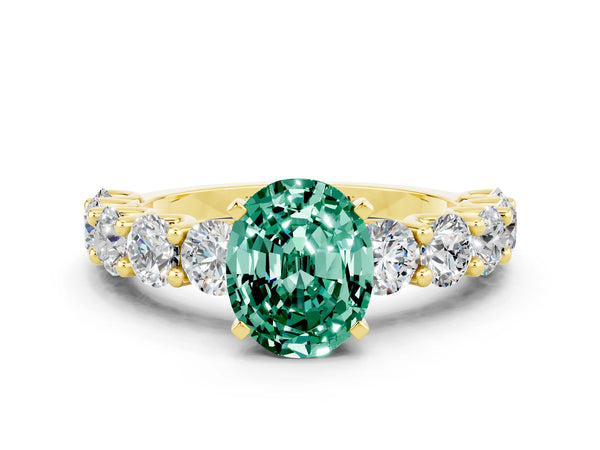 Yellow gold Oval Cut Green Sapphire Prong Setting with Side Stones on a Pave Band