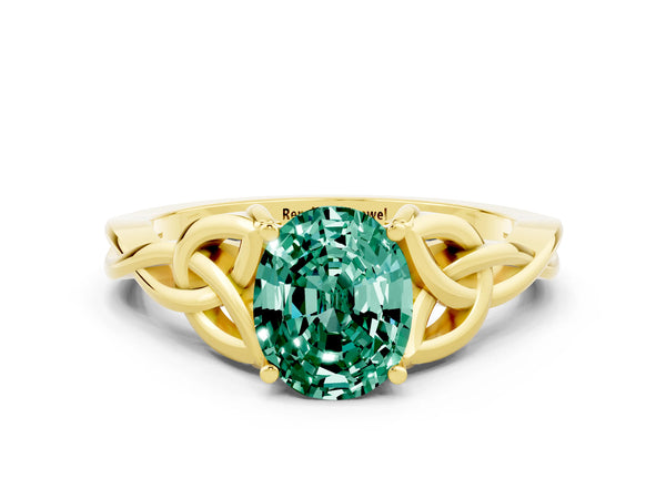 Yellow gold Oval Cut Green Sapphire Solitaire Celtic Knot Ring with Four-Prong Setting