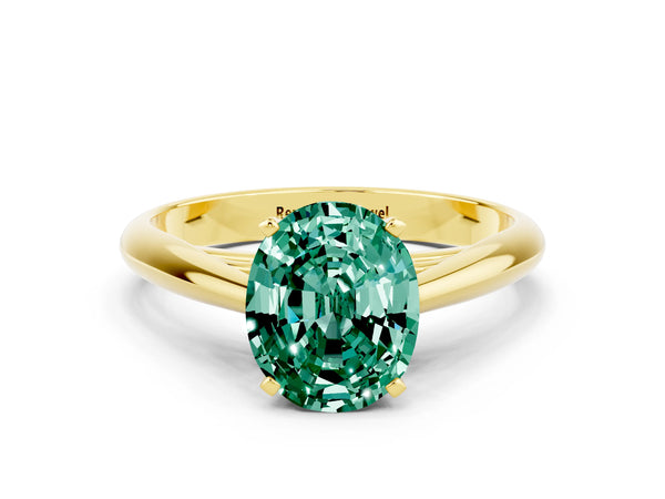 Yellow gold Oval Cut Green Sapphire Solitaire Engagement Ring with Cathedral Setting and Four-Prong Mount