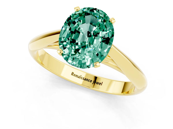 Yellow gold Oval Cut Green Sapphire Solitaire Engagement Ring with Cathedral Setting and Four-Prong Mount