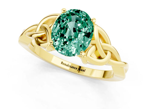 Yellow gold Oval Cut Green Sapphire Solitaire Engagement Ring with Celtic Knot Band and Four-Prong Setting_1