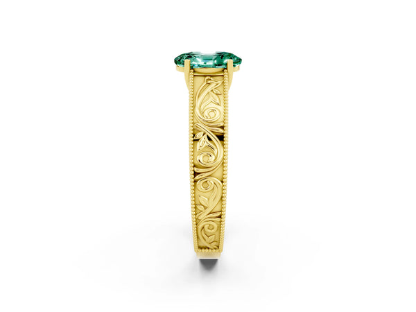Yellow gold Oval Cut Green Sapphire Solitaire Ring with Engraved Band and Four-Prong Setting