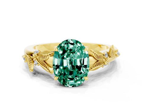 Yellow gold Oval Cut Green Sapphire Solitaire Ring with Leaf Motif Band and Four-Prong Setting