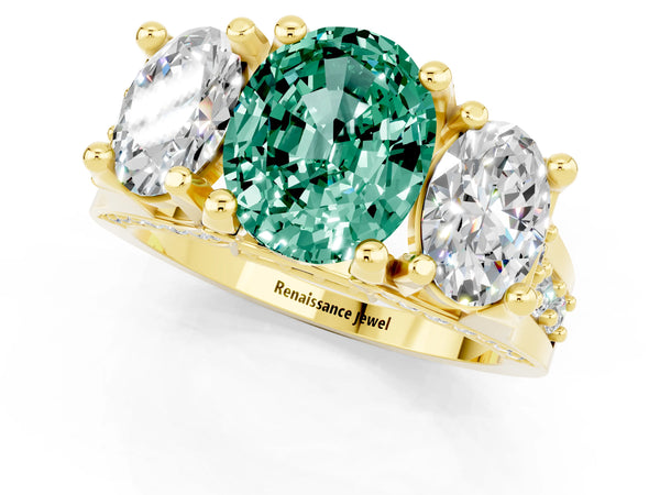 Yellow gold Oval Cut Green Sapphire Three-Stone Ring with Channel Set Band and Four-Prong Setting
