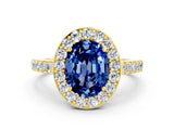 Yellow gold Oval Cut Halo Diamond Ring with Pavé Band and Three-Prong Setting