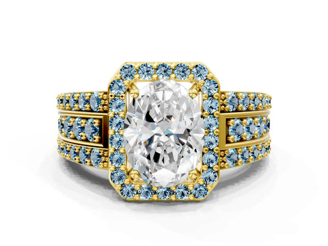 Yellow gold Oval Cut Halo Diamond Ring with Round with Aquamarine side stone Split Shank and Prong Setting