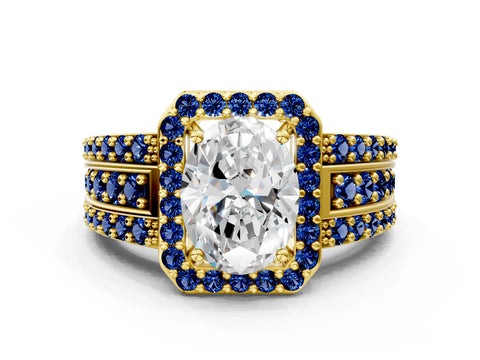 Yellow gold Oval Cut Halo Diamond Ring with Round with Blue Sapphire side stone Split Shank and Prong Setting