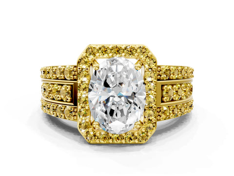 Yellow gold Oval Cut Halo Diamond Ring with Round with Yellow Sapphire side stone Split Shank and Prong Setting