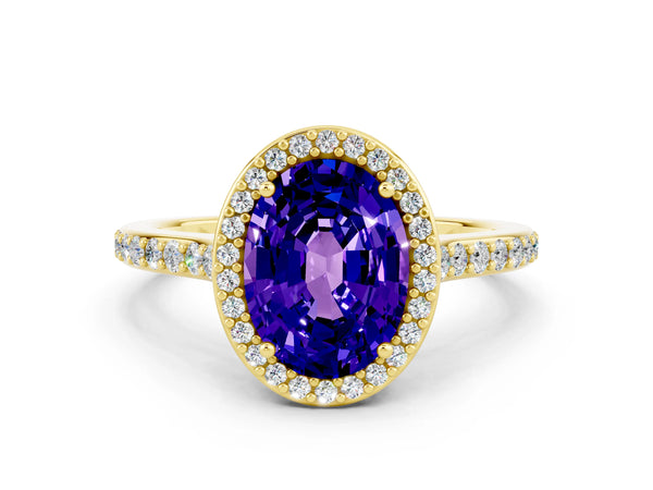 Yellow gold Oval Cut Tanzanite Halo Engagement Ring with Round Pavé Shoulders and Prong Setting