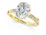 Yellow gold Oval Cut Moissanite Engagement Ring with Side Stone Accents and Four-Prong Setting_61